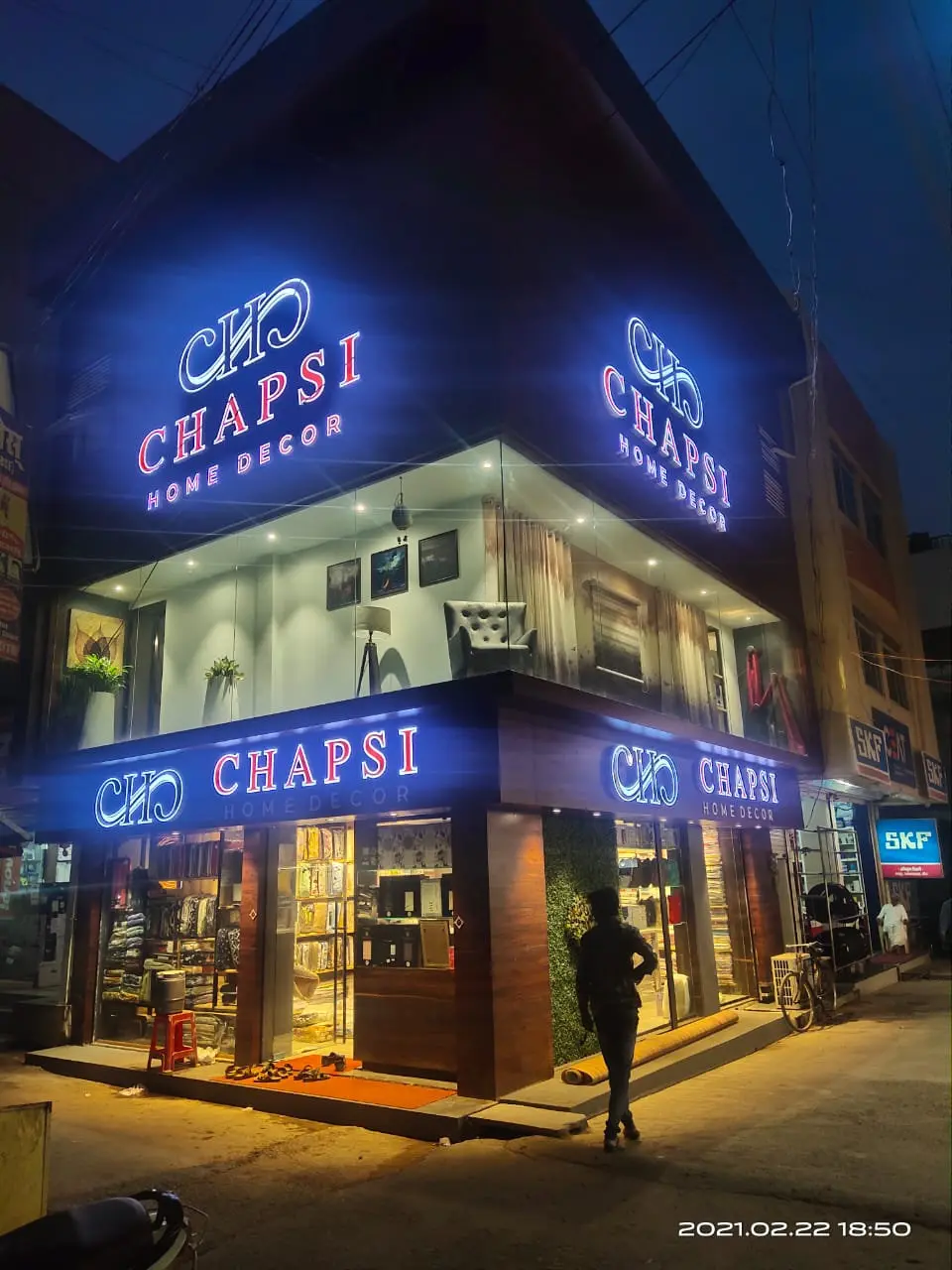 LED sign letters on a shop front at night